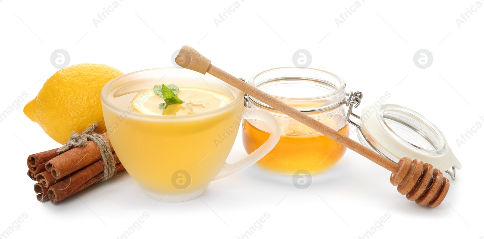 Photo of Cup with hot tea and other cold remedies on white background