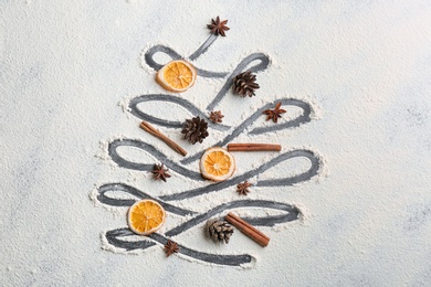 Photo of Flat lay composition with Christmas tree made of flour on grey table, flat lay