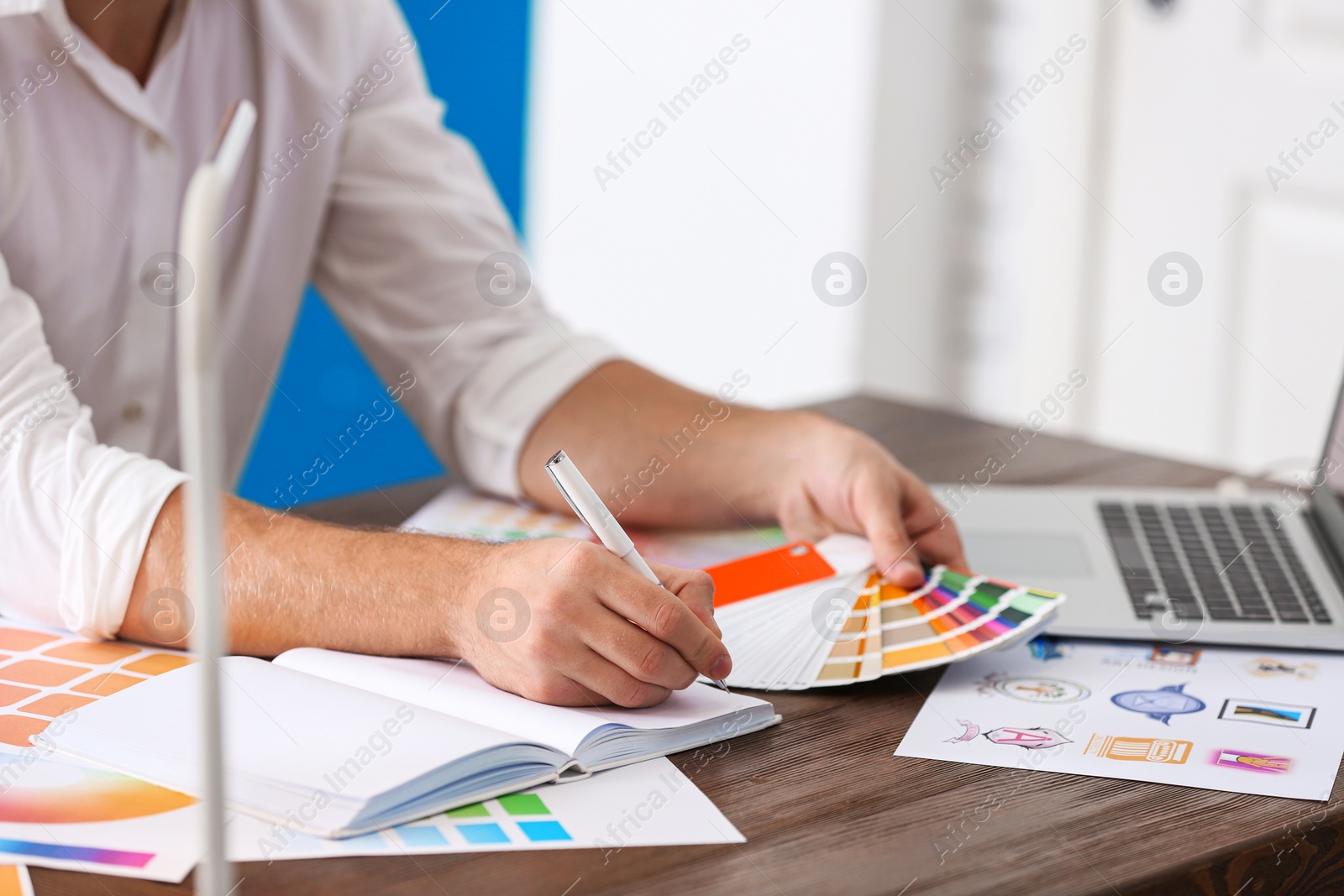 Photo of Professional interior designer at workplace in office, closeup