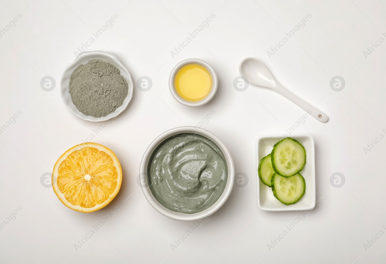 Photo of Homemade effective acne remedy and ingredients on white background