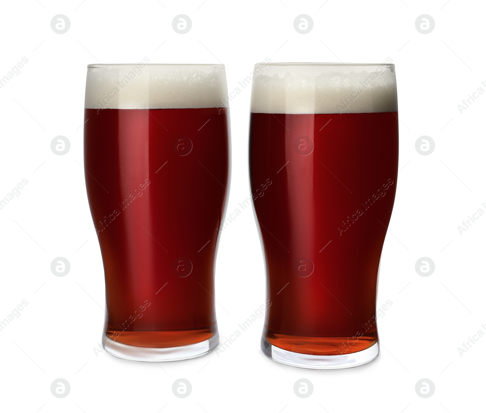 Photo of Glasses of delicious kvass isolated on white