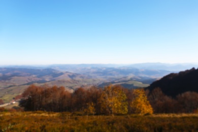 Photo of Beautiful mountain landscape with blue sky on sunny day, blurred view