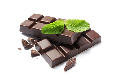 Pieces of dark chocolate with mint on white background