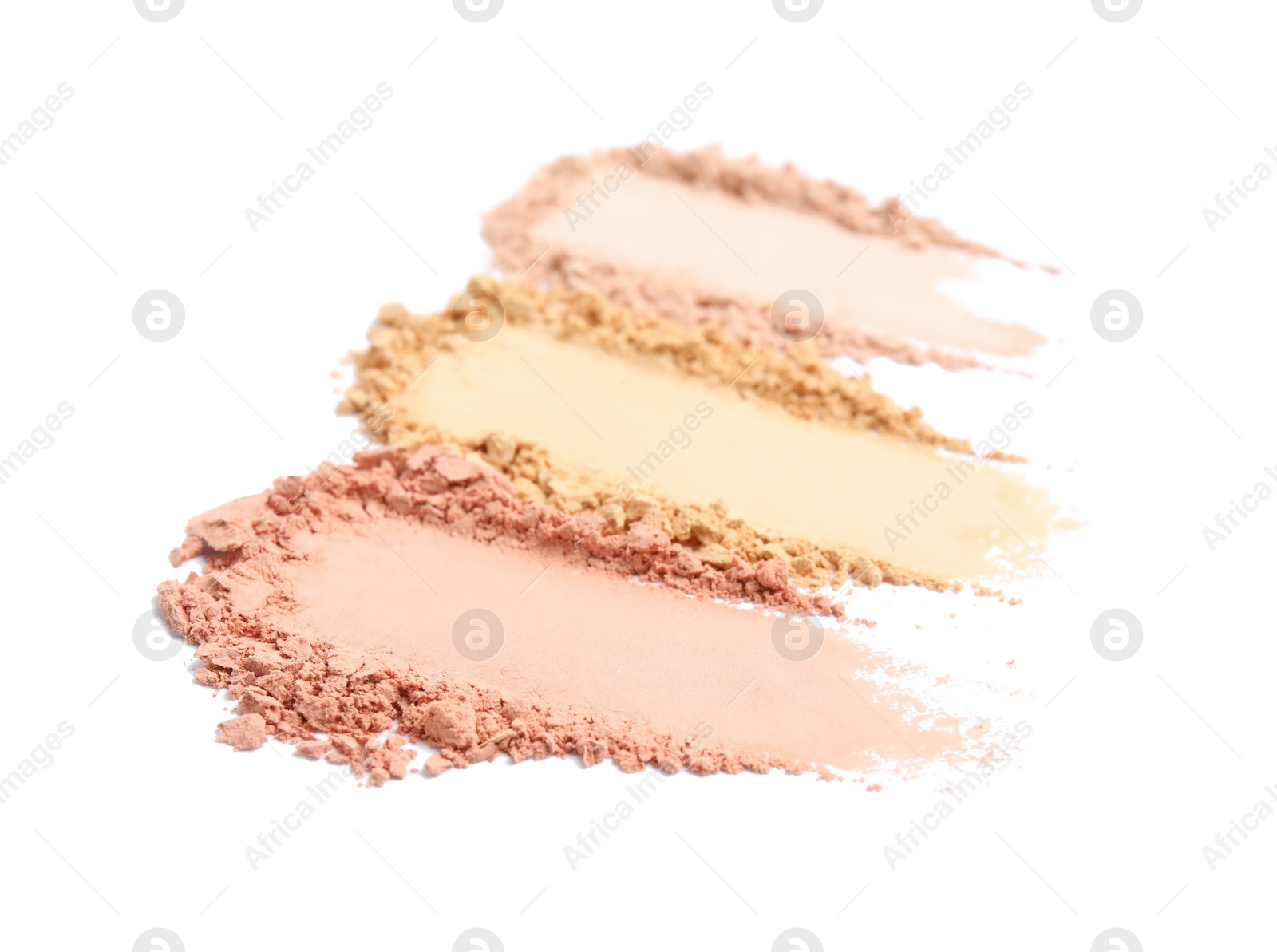 Photo of Swatches of different crushed face powders on white background