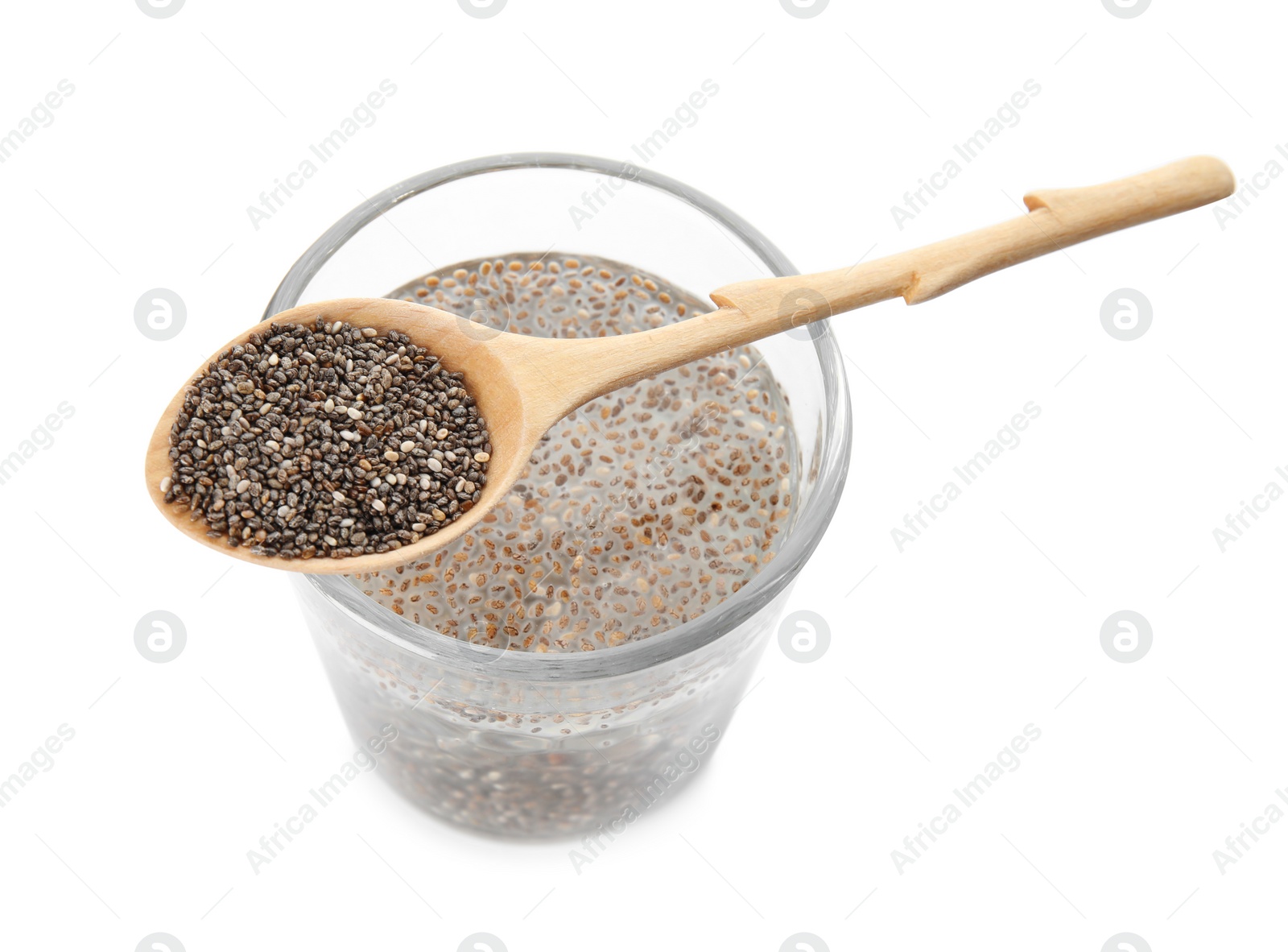 Photo of Glass of water with chia seeds and spoon on white background