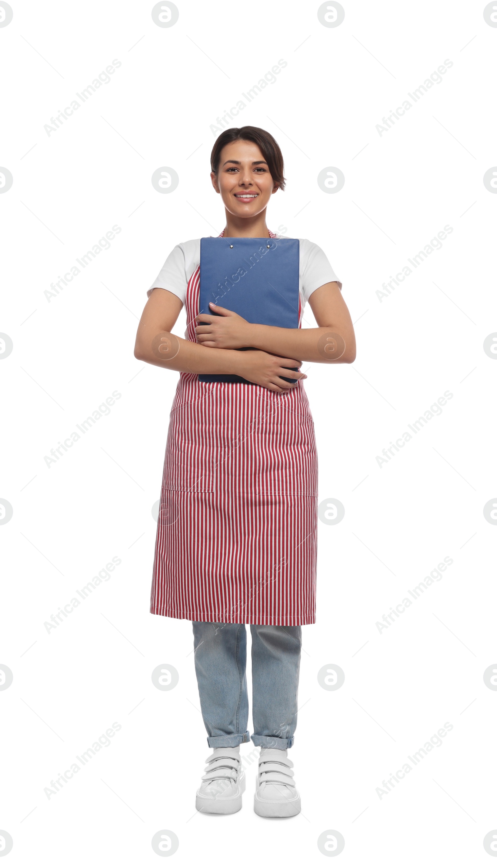 Photo of Young woman in red striped apron with clipboard on white background