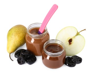 Photo of Jars with healthy baby food, dried prunes, pear and half of apple isolated on white
