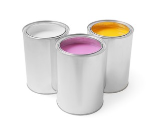 Photo of Cans with different paints on white background