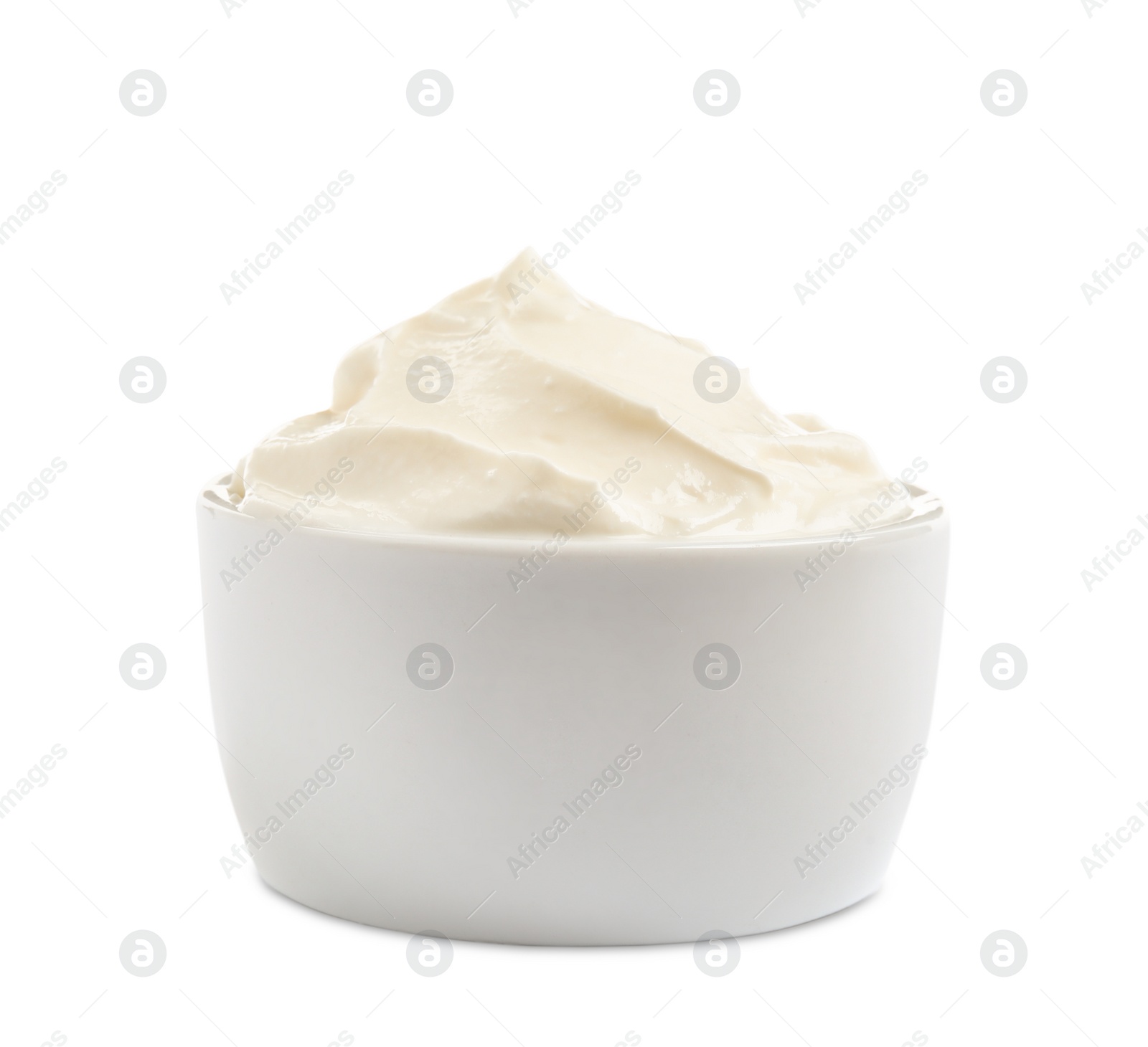 Photo of Ceramic bowl with fresh sour cream isolated on white