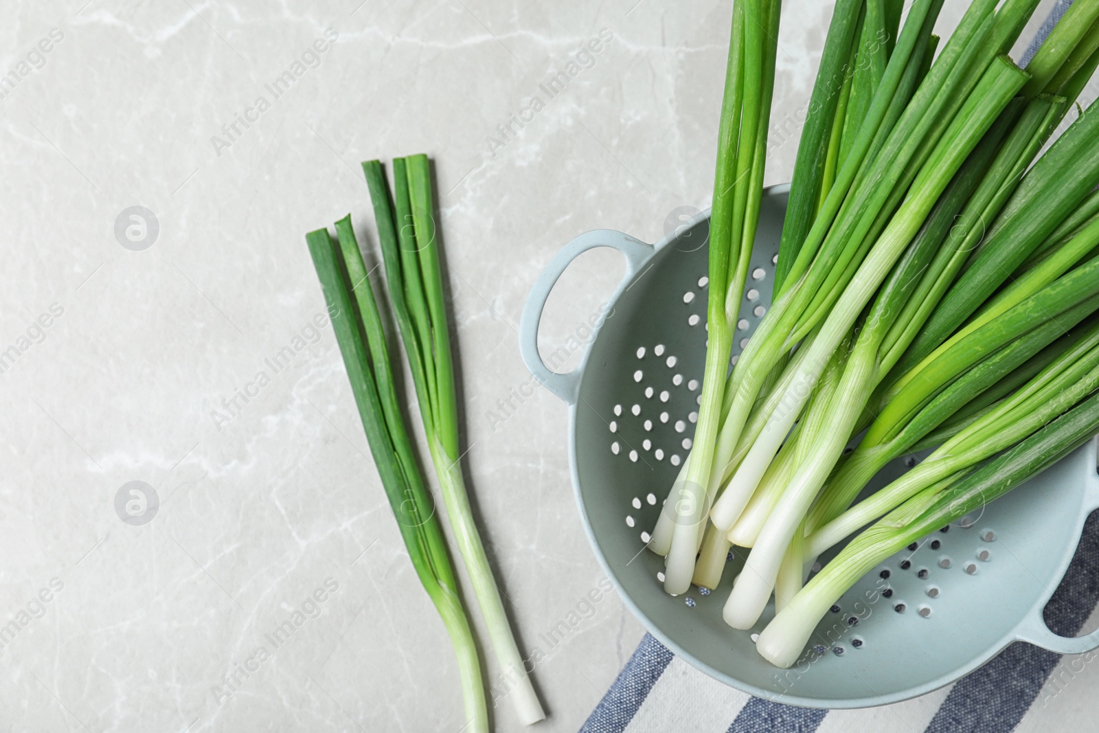 Photo of Flat lay composition with fresh green onion on marble background