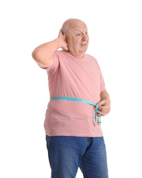 Photo of Fat senior man with measuring tape on white background. Weight loss