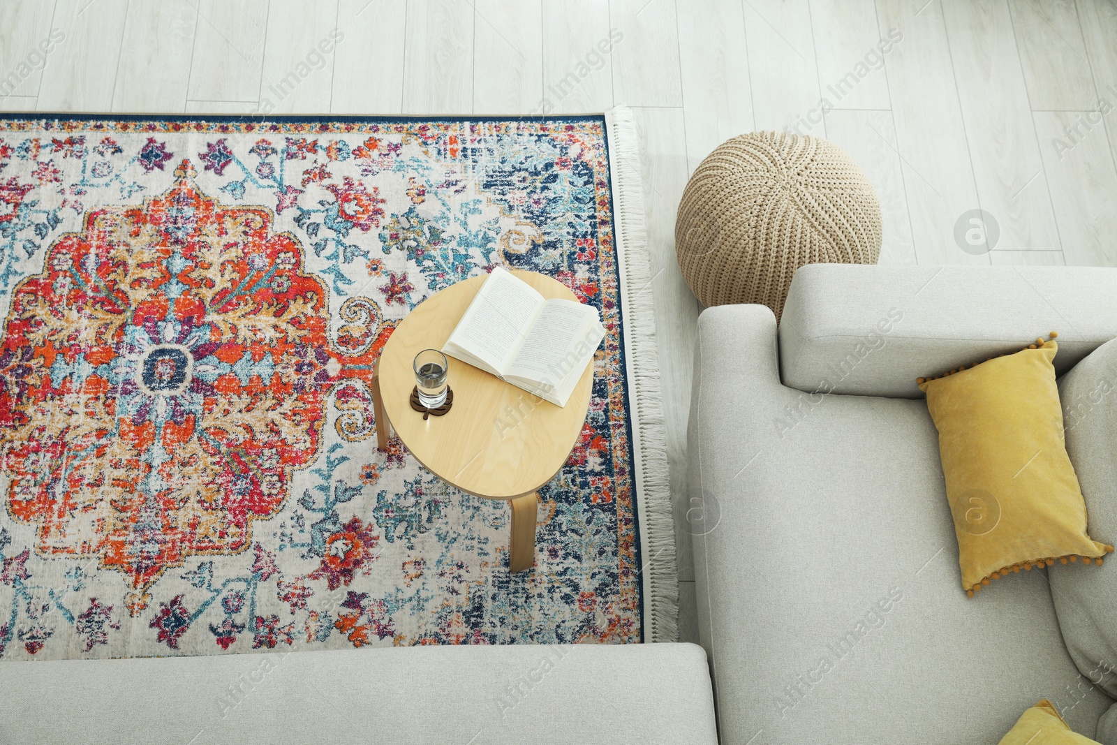 Photo of Stylish living room with beautiful carpet and furniture, top view. Interior design