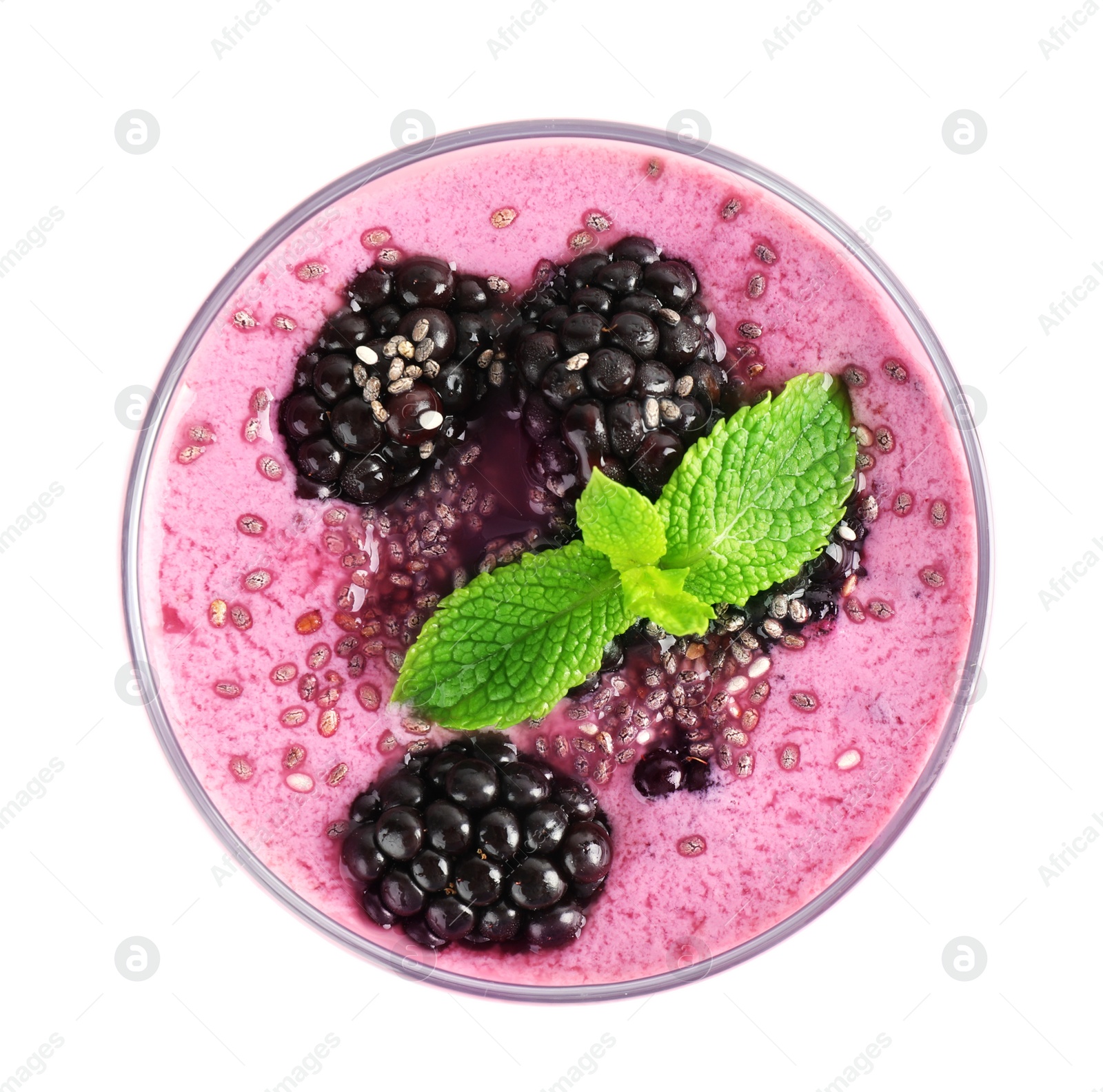 Photo of Delicious blackberry smoothie in glass on white background, top view