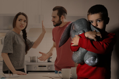Image of Double exposure of sad little boy with toy and his arguing parents