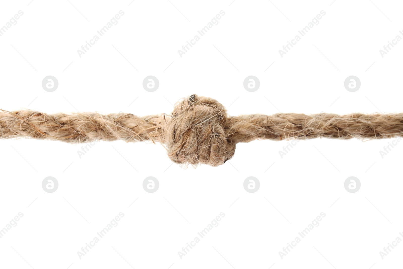 Photo of Hemp rope with knot on white background. Organic material