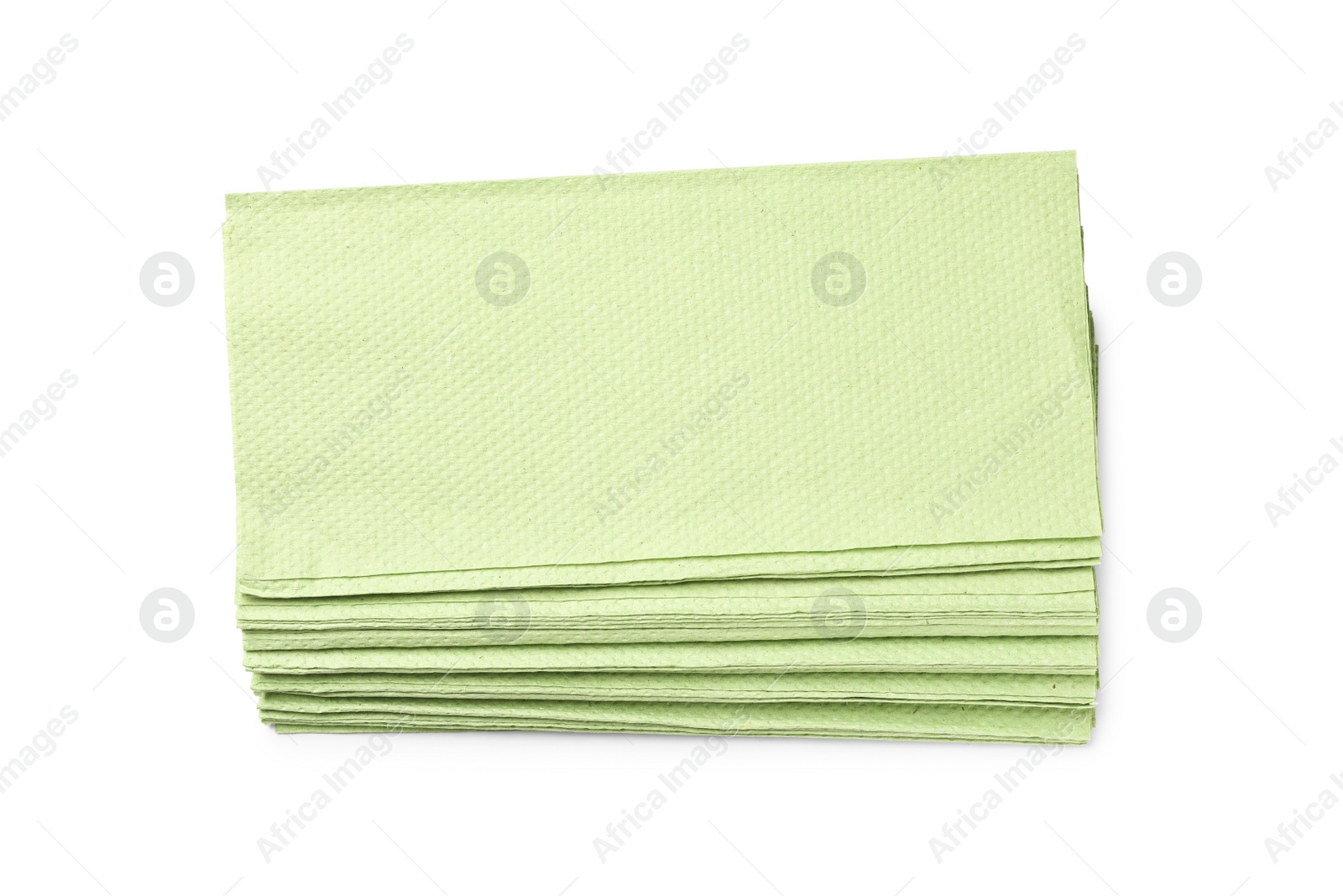 Photo of Green paper towels on white background, top view