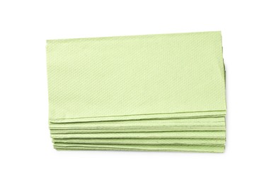 Green paper towels on white background, top view