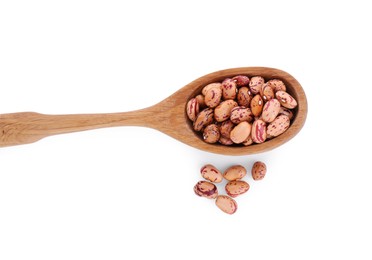 Photo of Wooden spoon and dry kidney beans isolated on white, top view