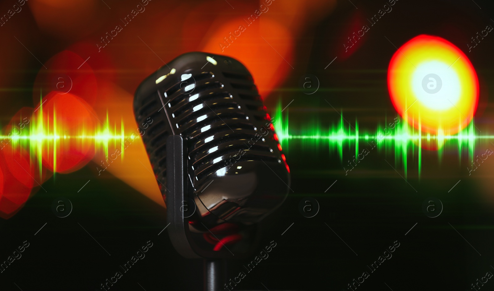 Image of Microphone and radio wave on dark background, bokeh effect