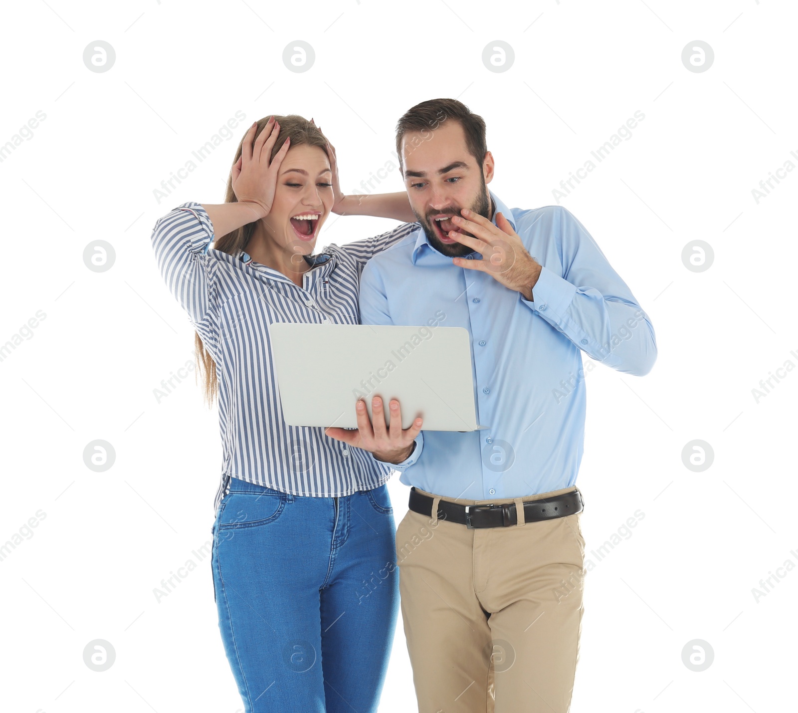 Photo of Emotional young people with laptop celebrating victory on white background