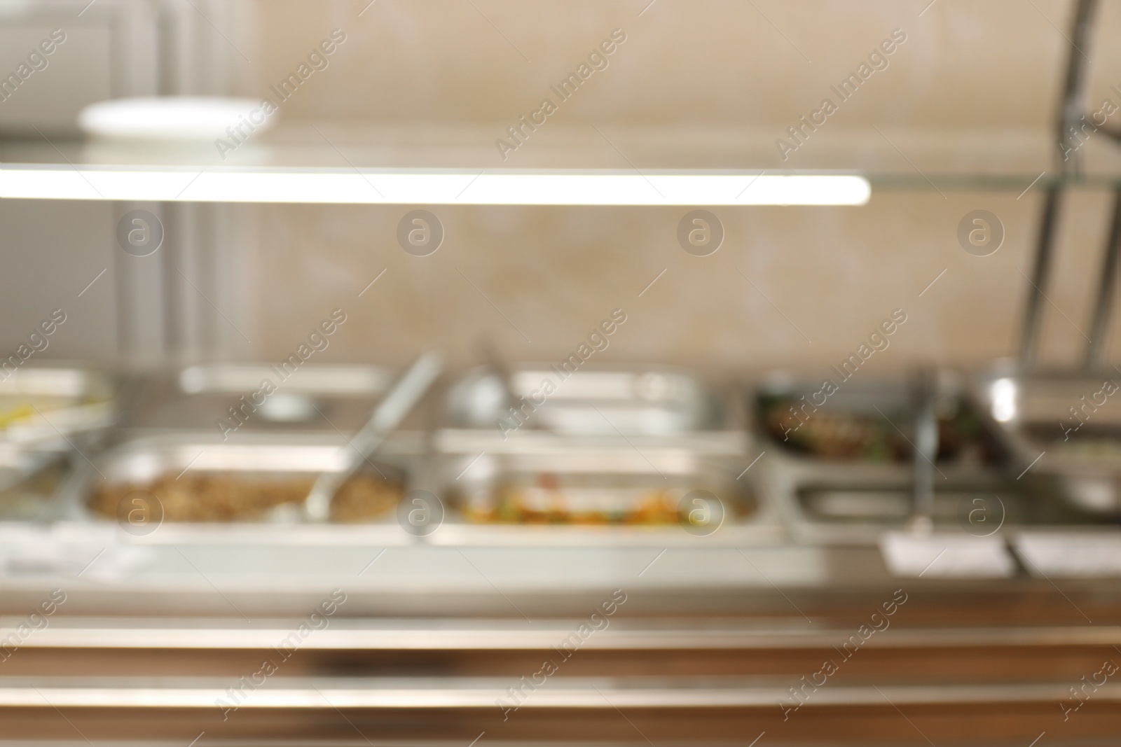 Photo of Blurred view of serving line with food in school canteen