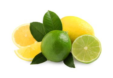 Fresh ripe lemons, limes and green leaves on white background