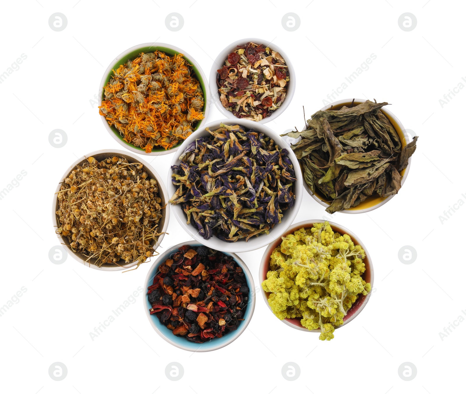 Photo of Many different dry herbs and flowers in bowls isolated on white, top view