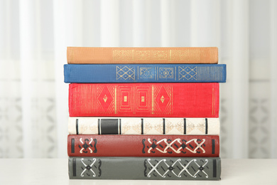 Collection of different books on table indoors