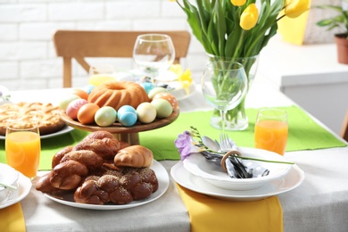 Festive Easter table setting with traditional meal at home