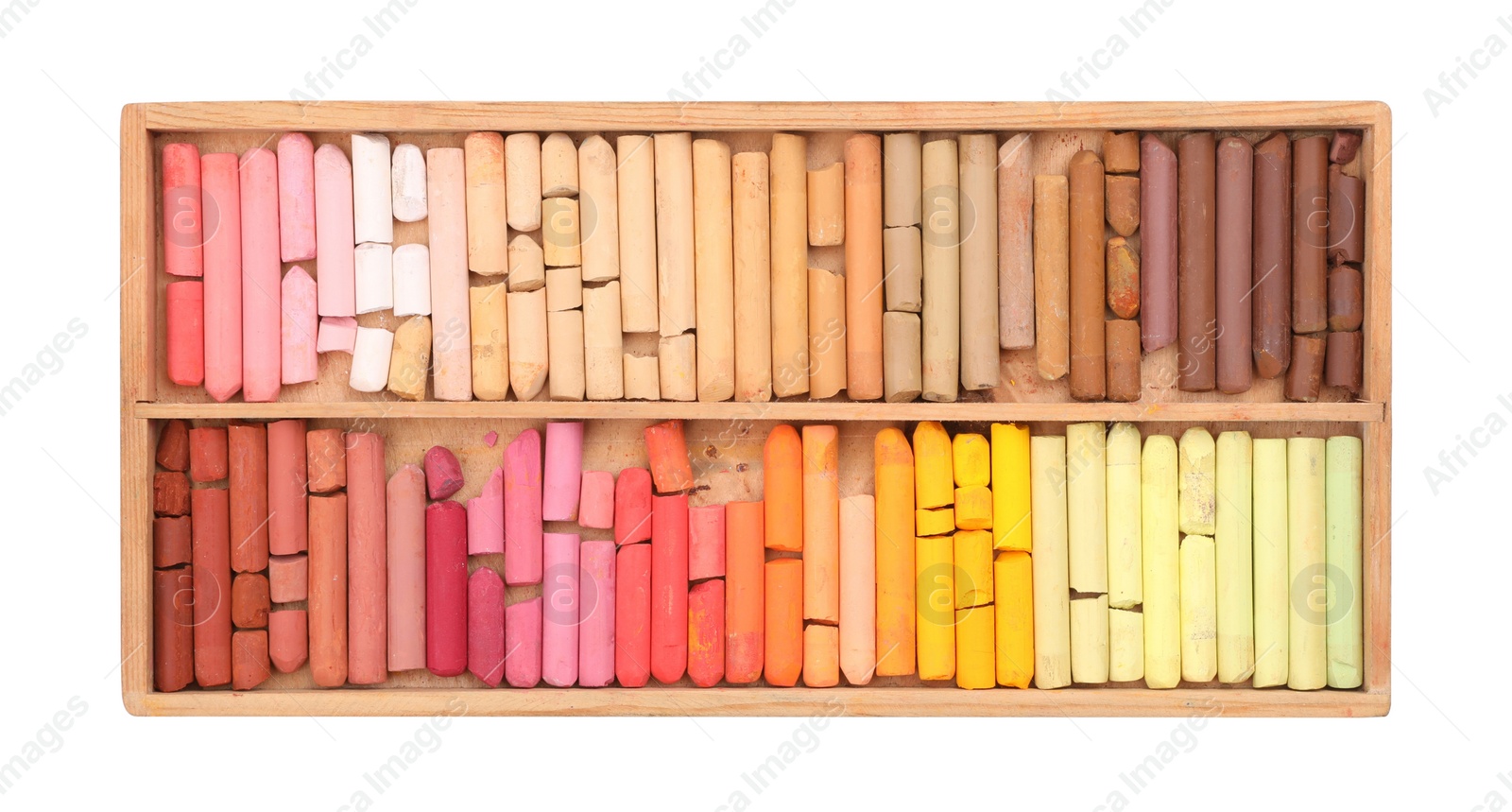 Photo of Set of soft pastels on white background in wooden box, top view. Drawing material