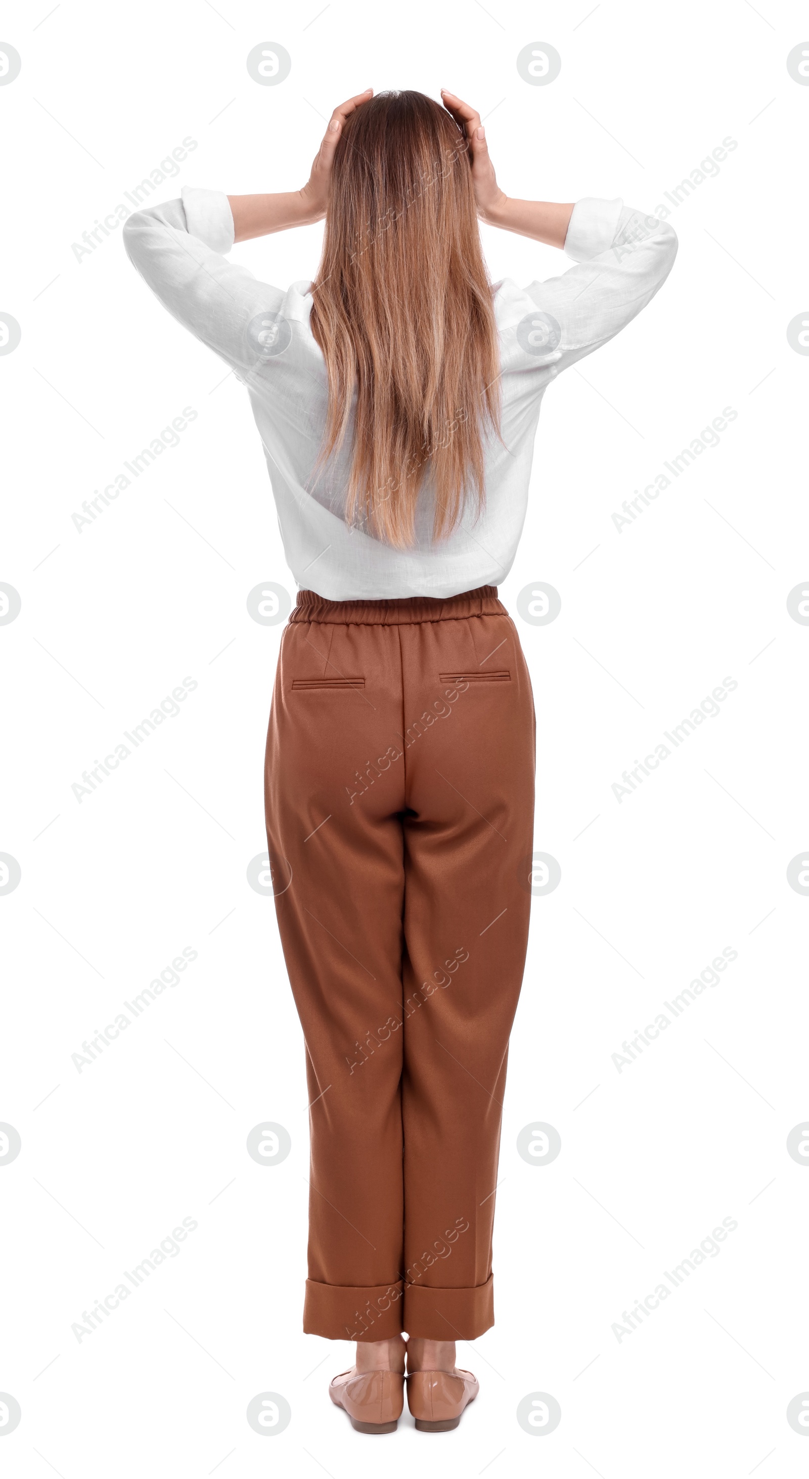 Photo of Businesswoman standing on white background, back view