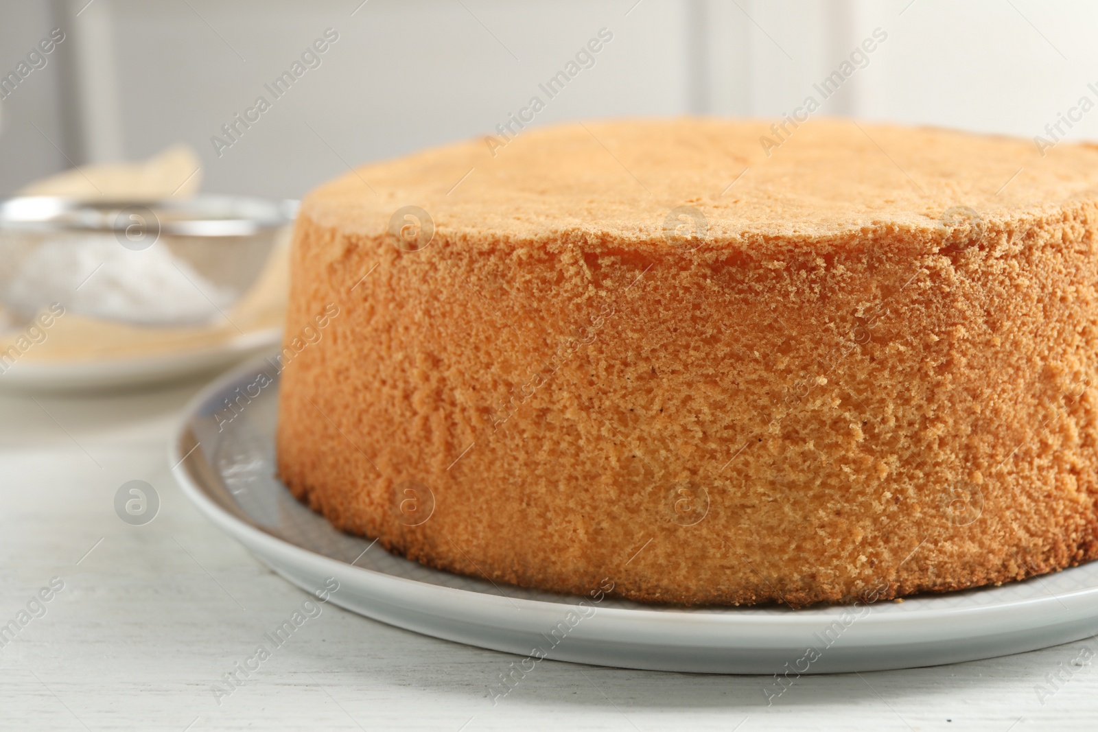 Photo of Delicious fresh homemade cake on white table, closeup