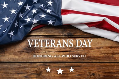 Image of Veterans day. Honoring all who served. American flag on wooden background, top view