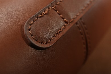 Photo of Texture of brown leather as background, closeup