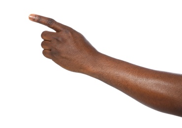 Photo of African-American man pointing at something on white background, closeup