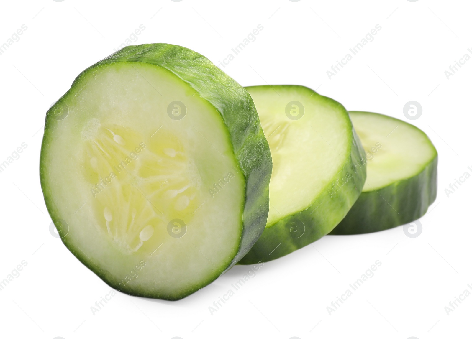 Photo of Slices of long cucumber isolated on white