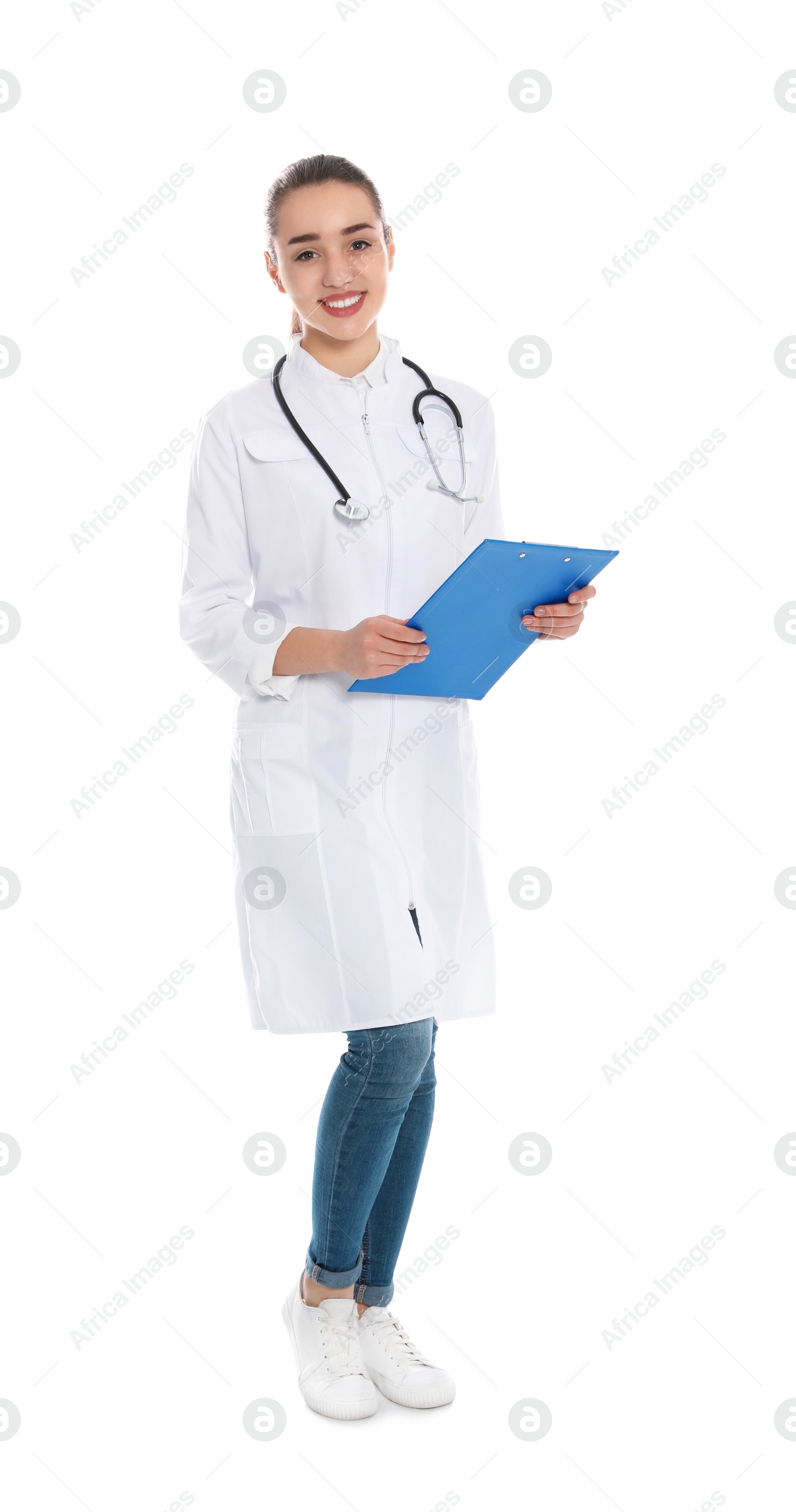 Photo of Full length portrait of medical doctor with clipboard and stethoscope isolated on white