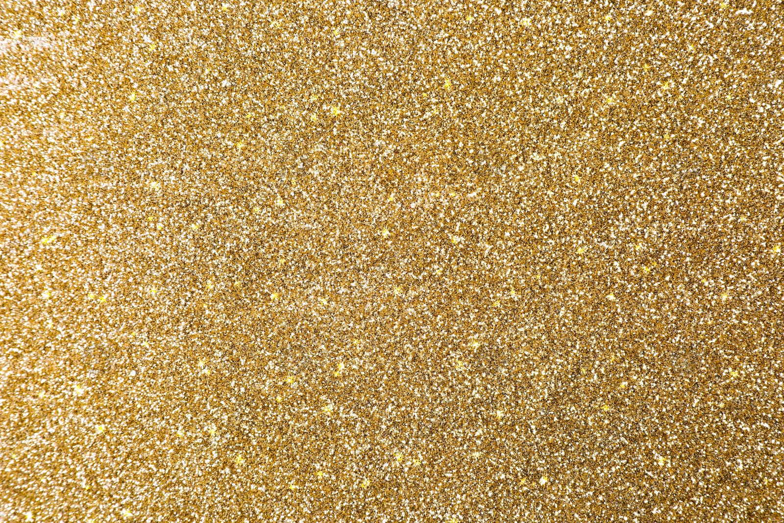 Image of Beautiful shiny brass glitter as background, closeup