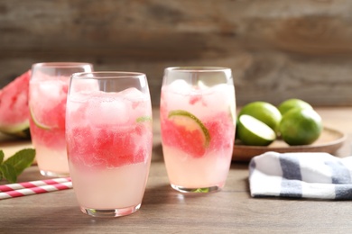 Delicious refreshing watermelon drink on wooden table