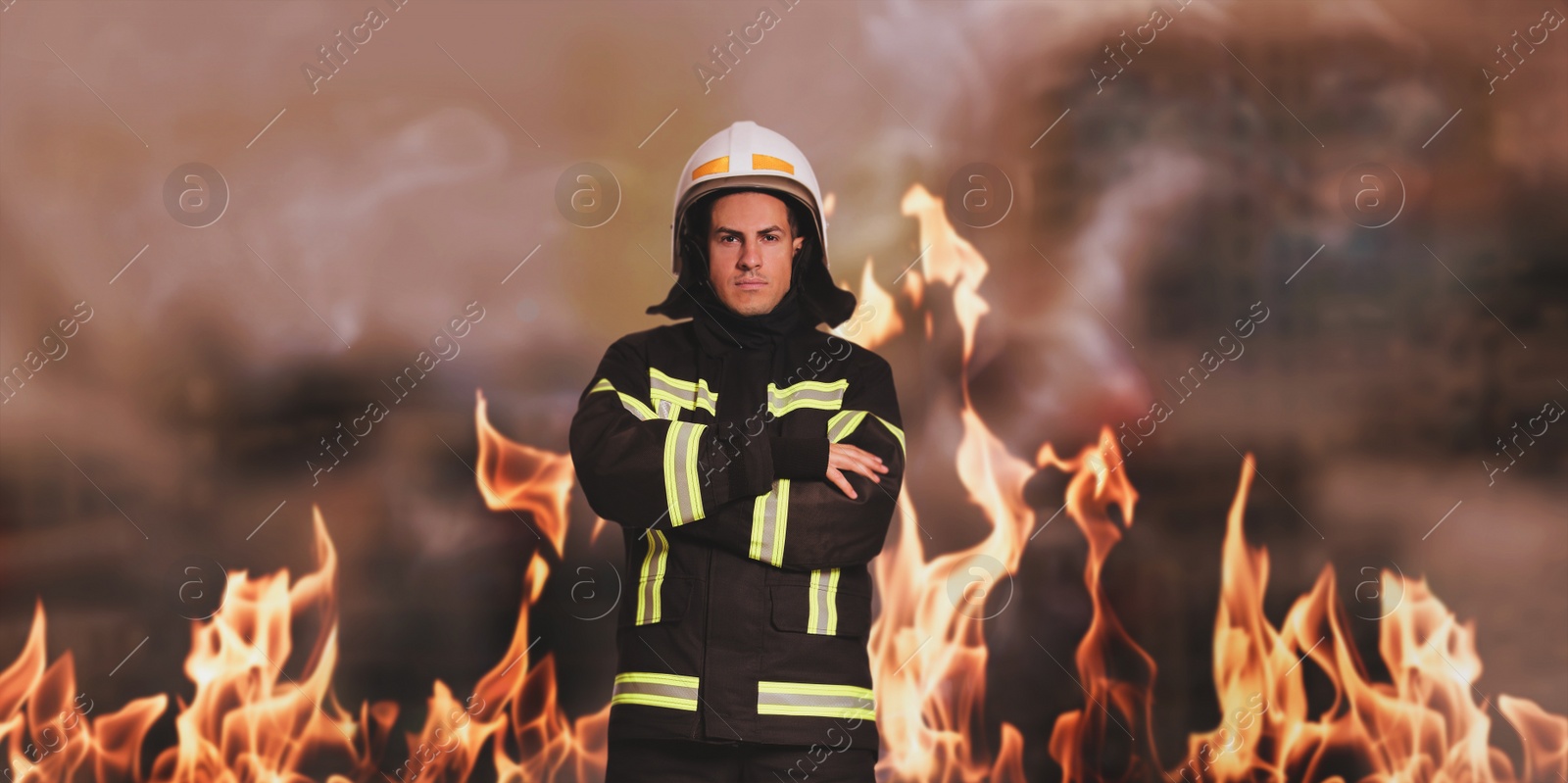 Image of Rescuer wearing uniform and helmet. Professional firefighter