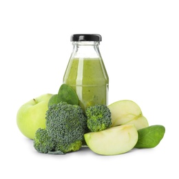 Bottle of delicious juice and fresh ingredients on white background