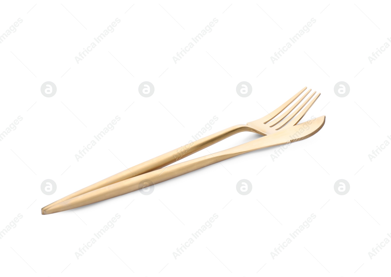 Photo of Elegant shiny golden fork and knife on white background