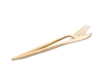 Photo of Elegant shiny golden fork and knife on white background