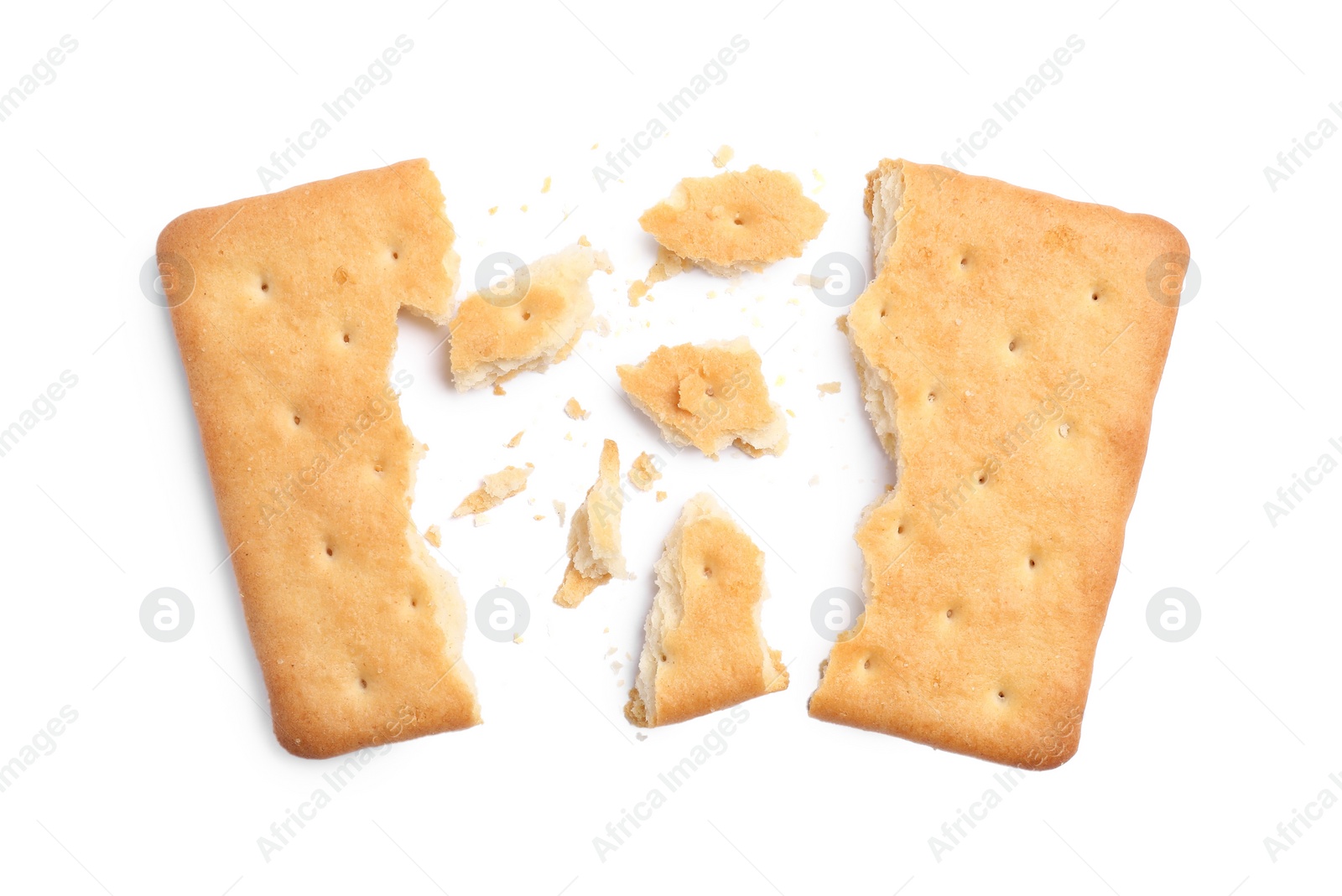 Photo of Crispy broken cracker isolated on white, top view