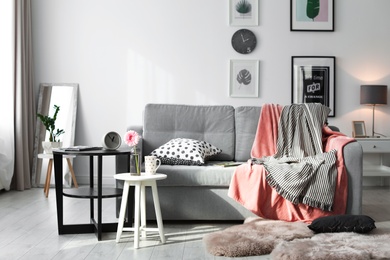Photo of Elegant living room interior with comfortable sofa