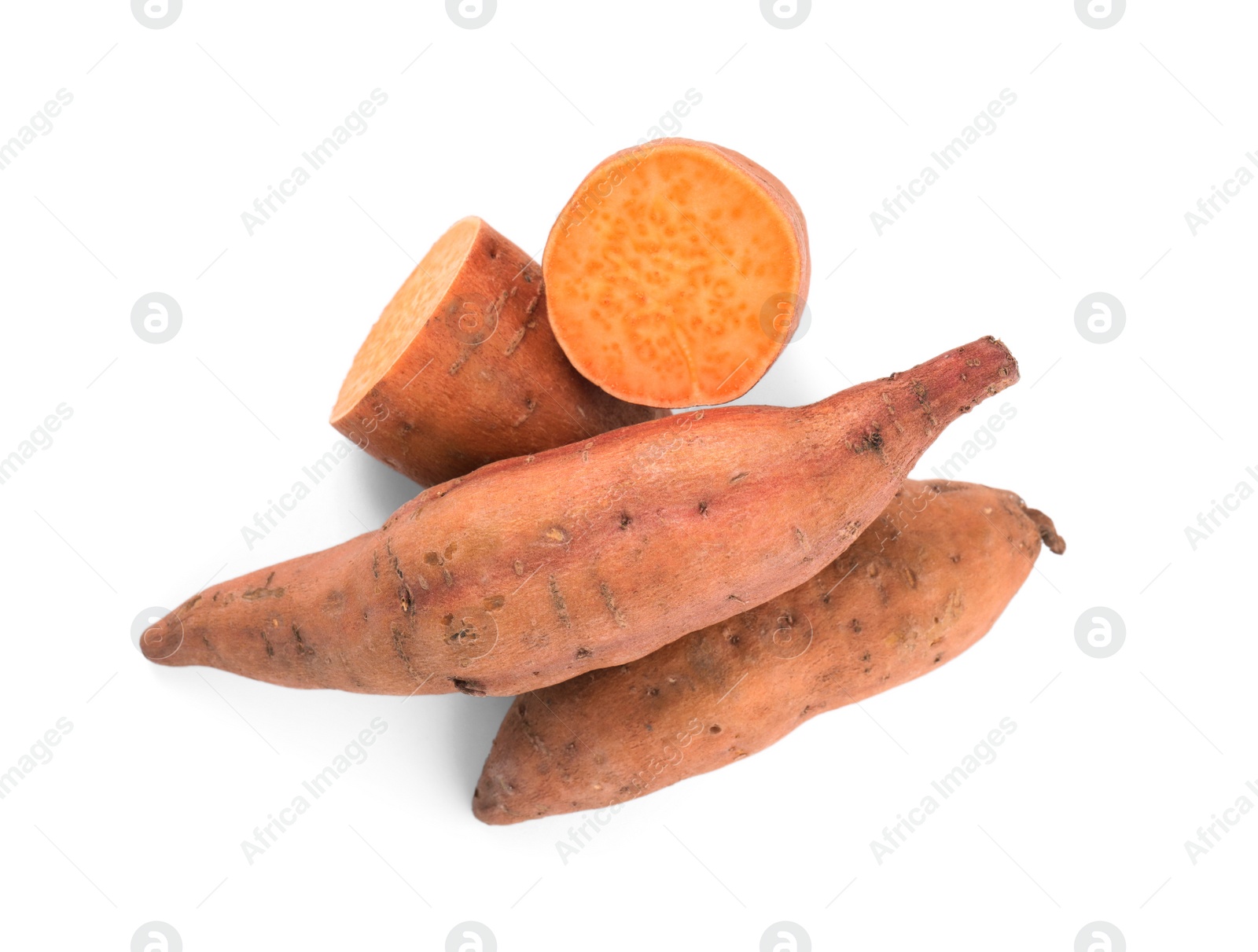 Photo of Whole and cut ripe sweet potatoes on white background, top view