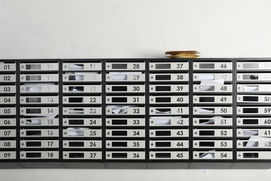 Photo of New mailboxes with keyholes, numbers and receipts in post office
