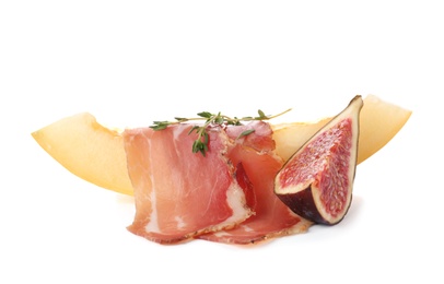 Photo of Melon slice with prosciutto and fig on white background