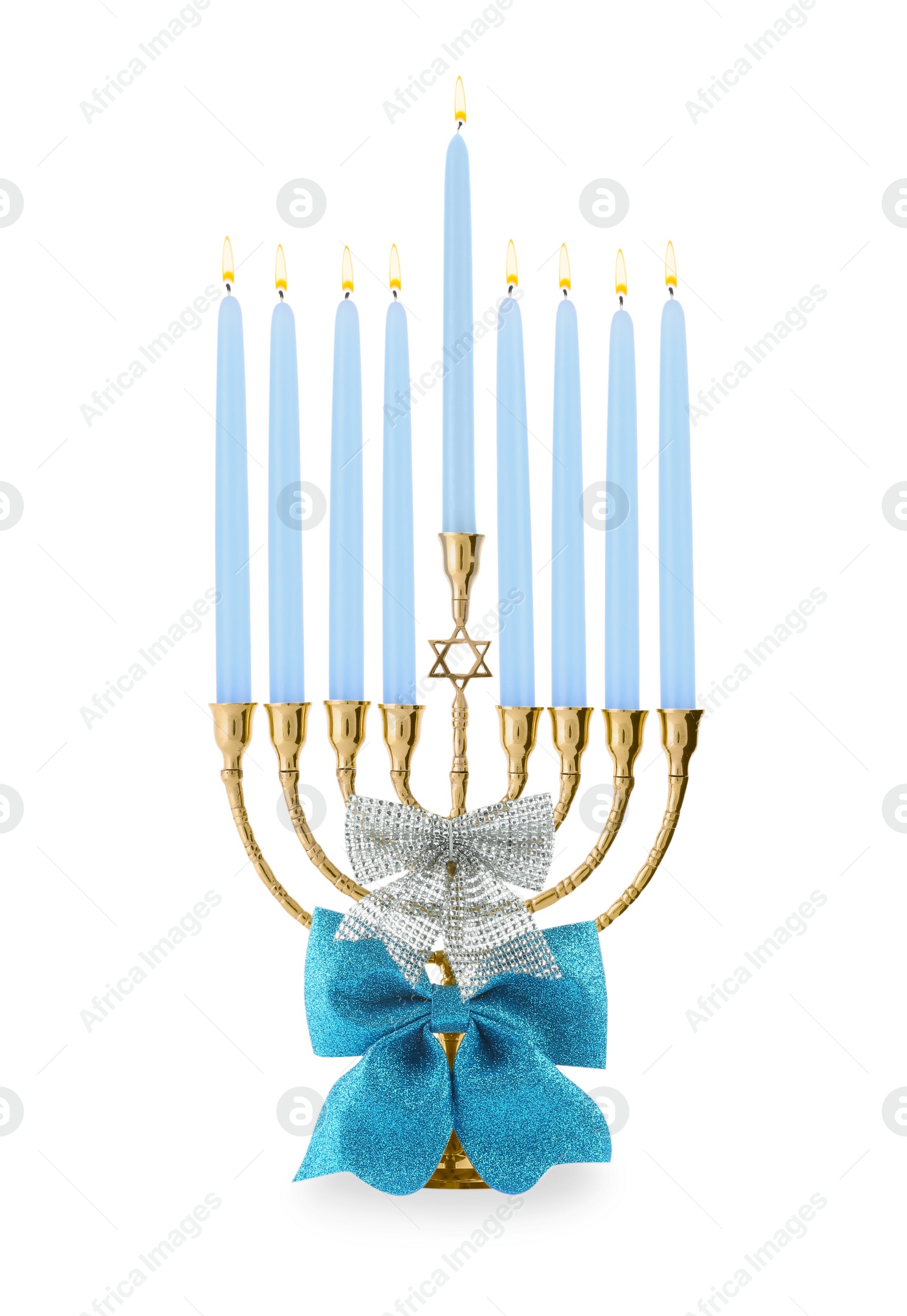 Photo of Hanukkah celebration. Menorah with light blue candles and bow isolated on white