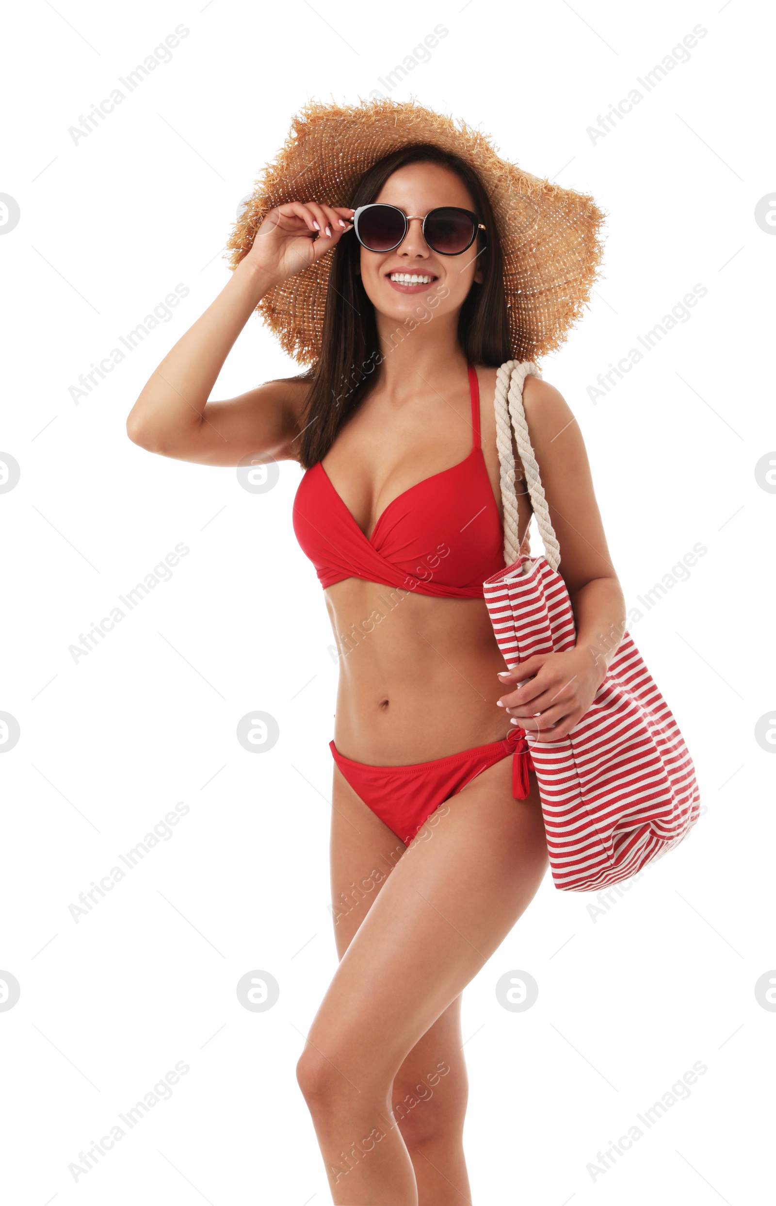 Photo of Pretty sexy woman with slim body in stylish red bikini on white background